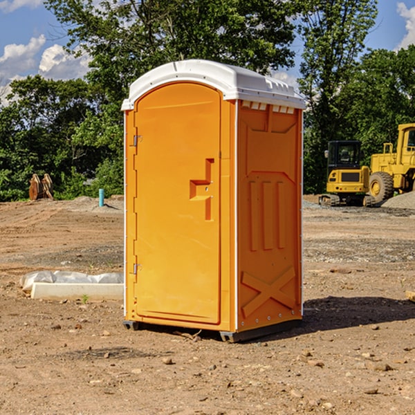 how often are the portable restrooms cleaned and serviced during a rental period in Neotsu